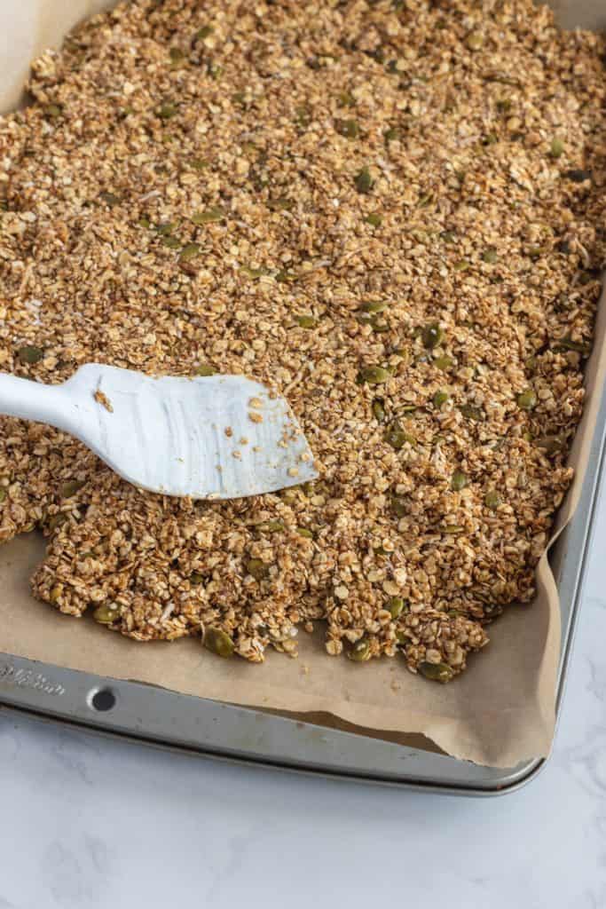 pressing the mixture into a sheet pan