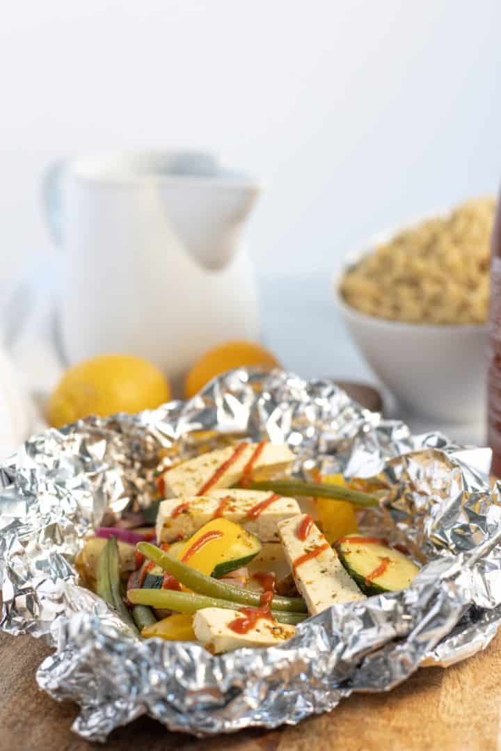 Tofu and Veggies in a foil pockets open 