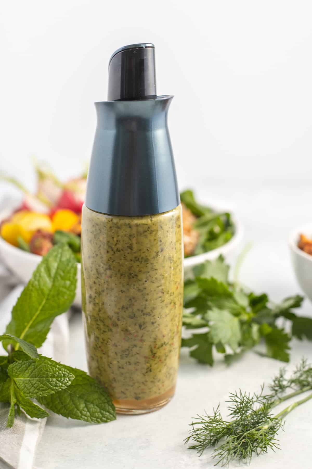 Fresh Herb vinaigrette in glass container