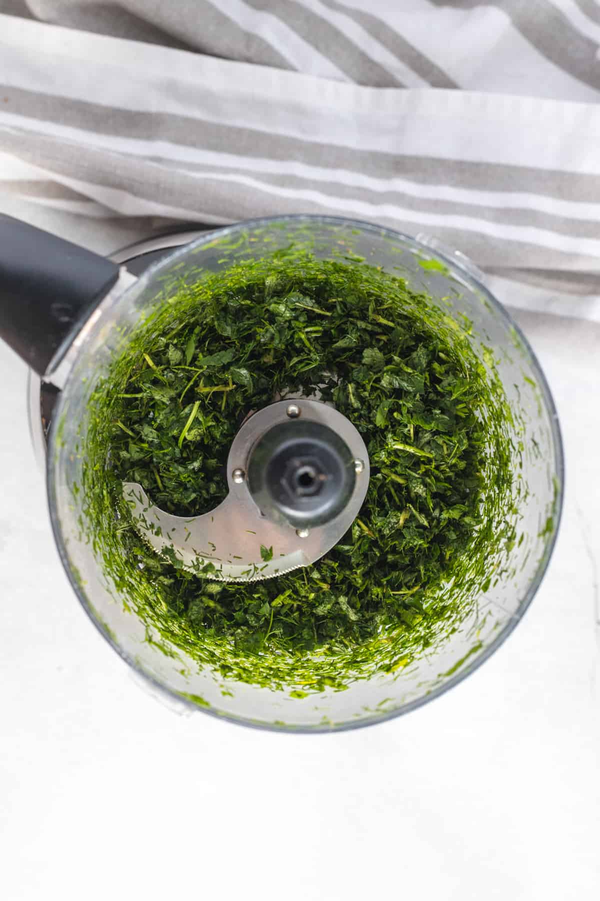 fresh herbs blended in the blender 