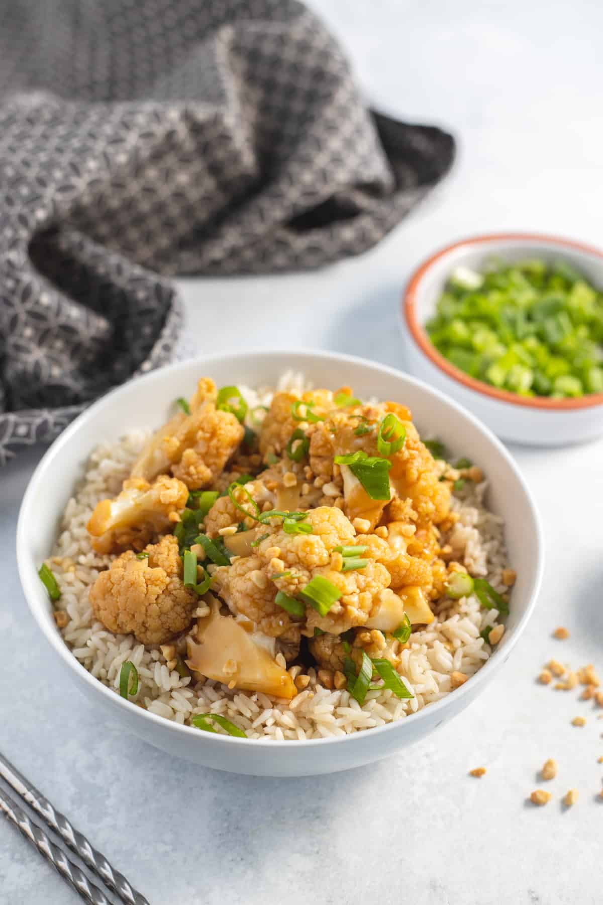 Kung Pao Cauliflower in a bowl over rice