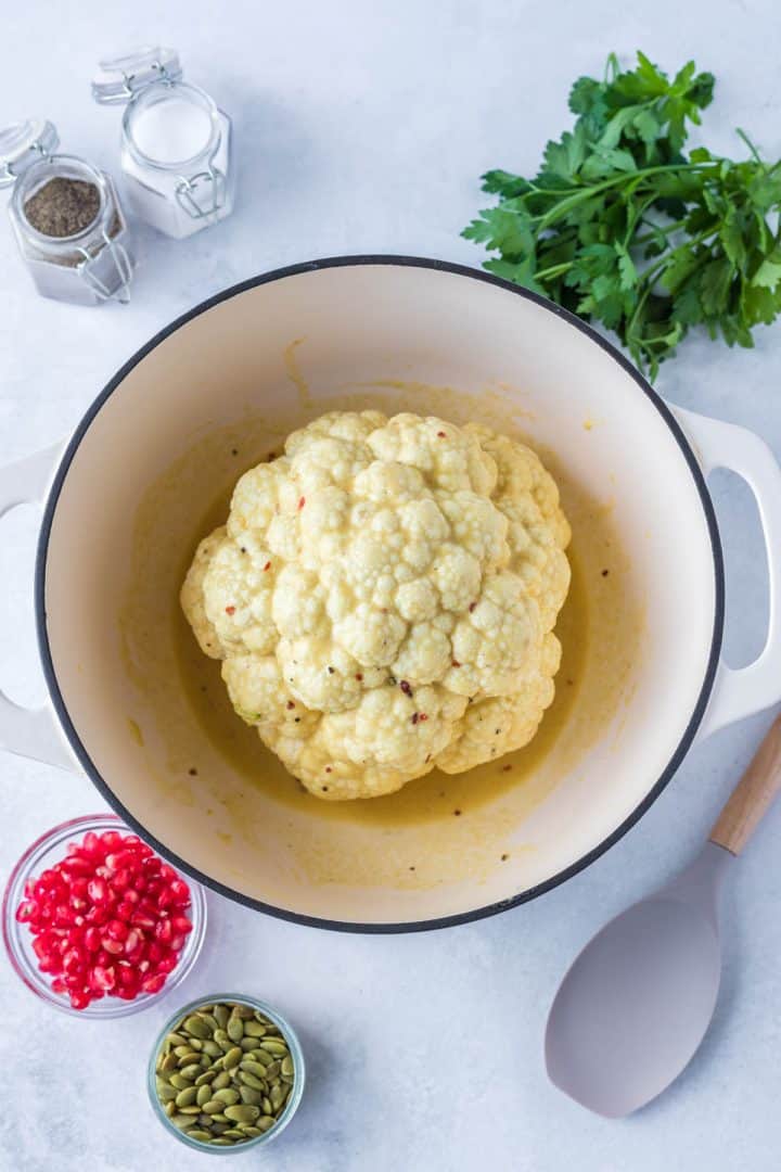 Cauliflower in the Dutch oven casserole ready to be cooked