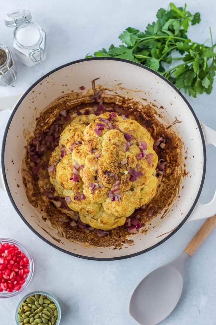 Cauliflower in the dutch oven top view cooked