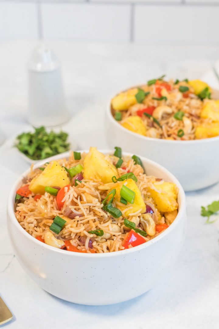 Vegan Pineapple Fried Rice serve in a white bowl