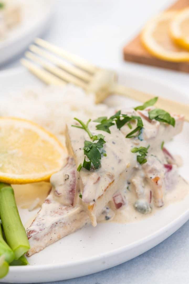 Close up of the Pan-Fried Tofu with Creamy Lemon Sauce in a white plate