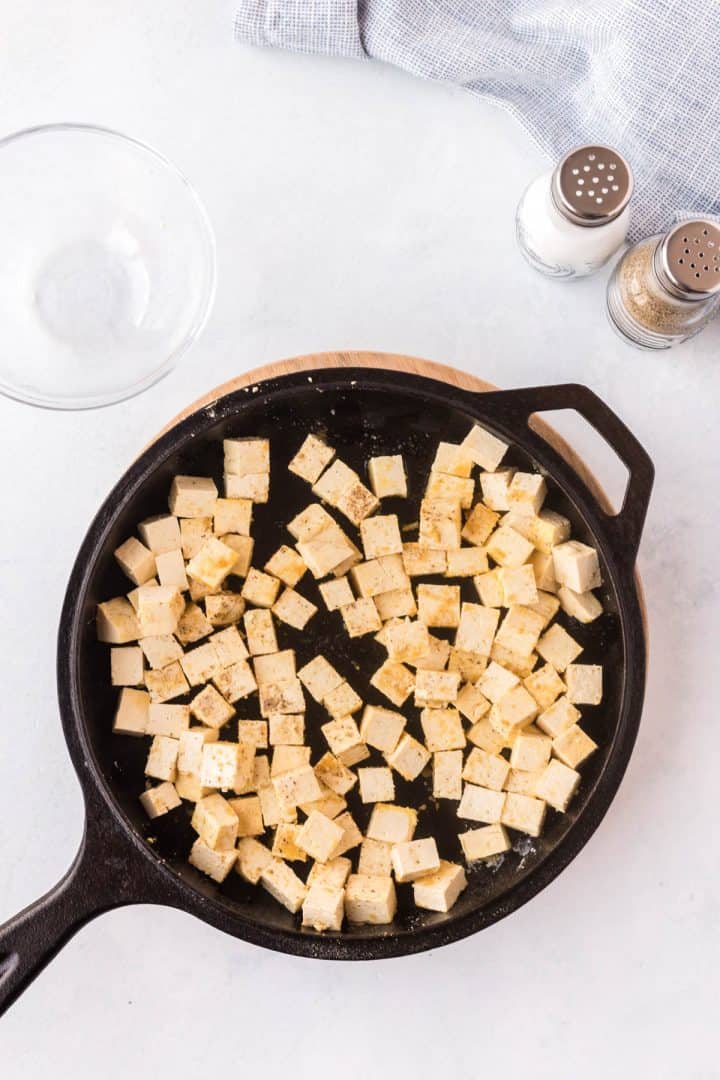 tofu in a skillet ready to cook.