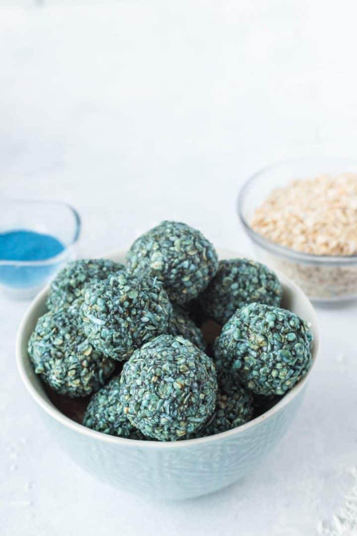 These Blue Spirulina Protein Energy Balls serve in a bowl.