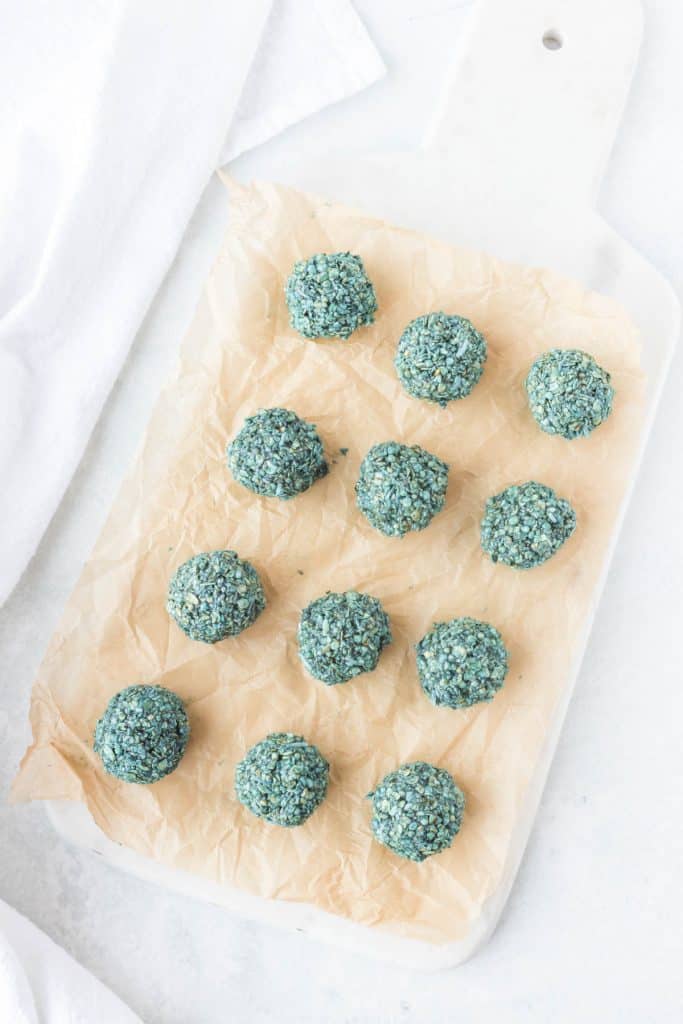 energy balls on a cutting board 