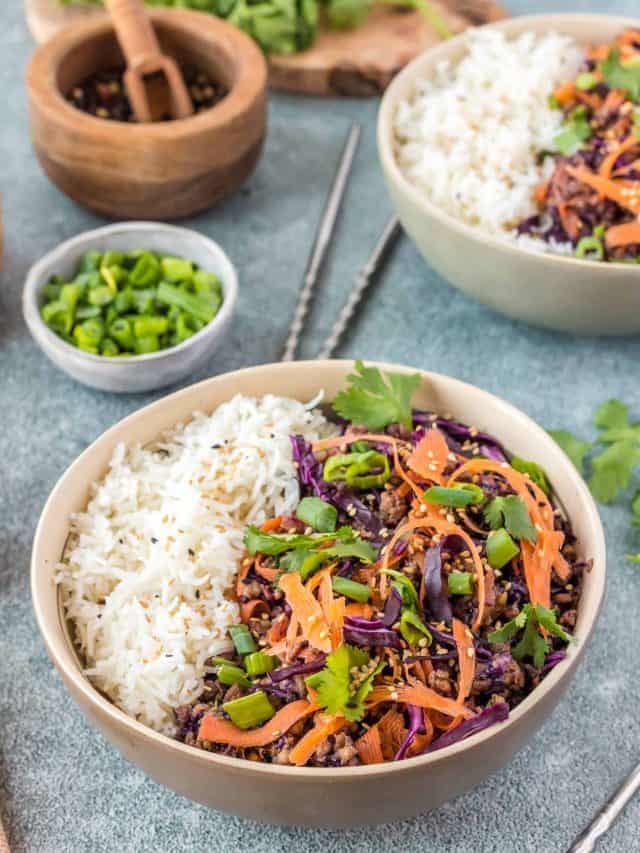 inside out egg roll serve in a bowl with rice.