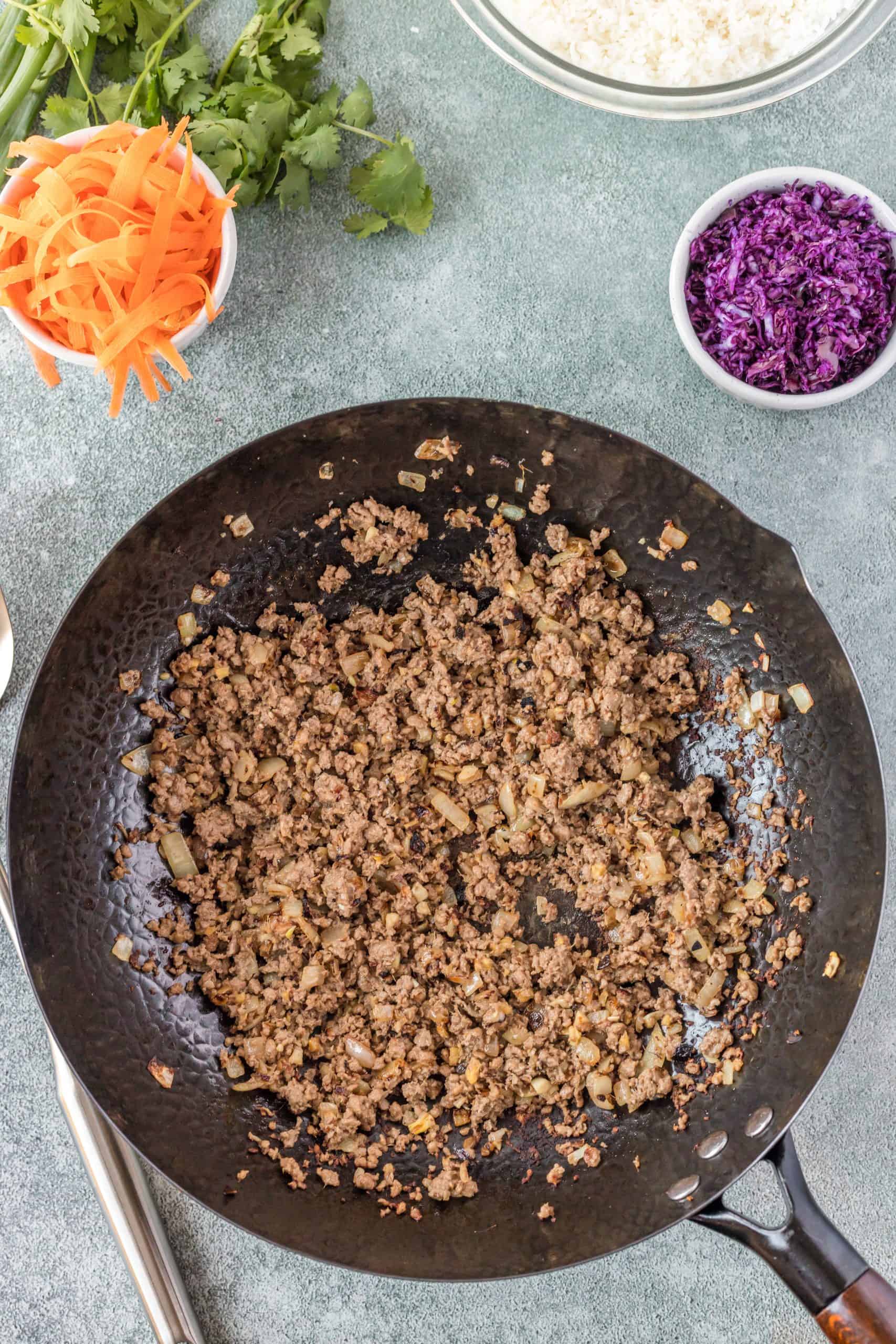 cook ground beef in a wok