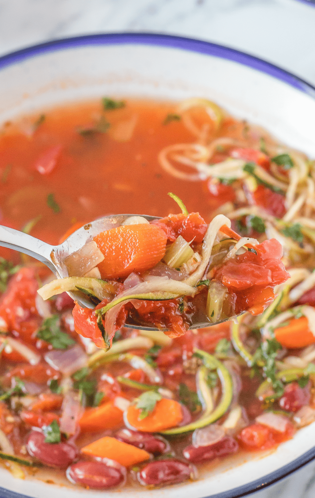 Spoonful with soup close up.