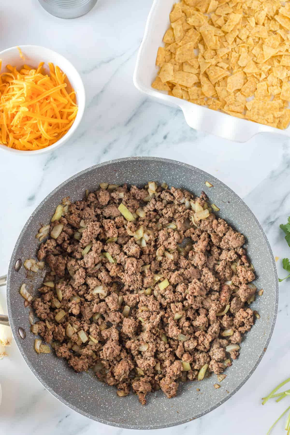 Cooked beef in the skillet.