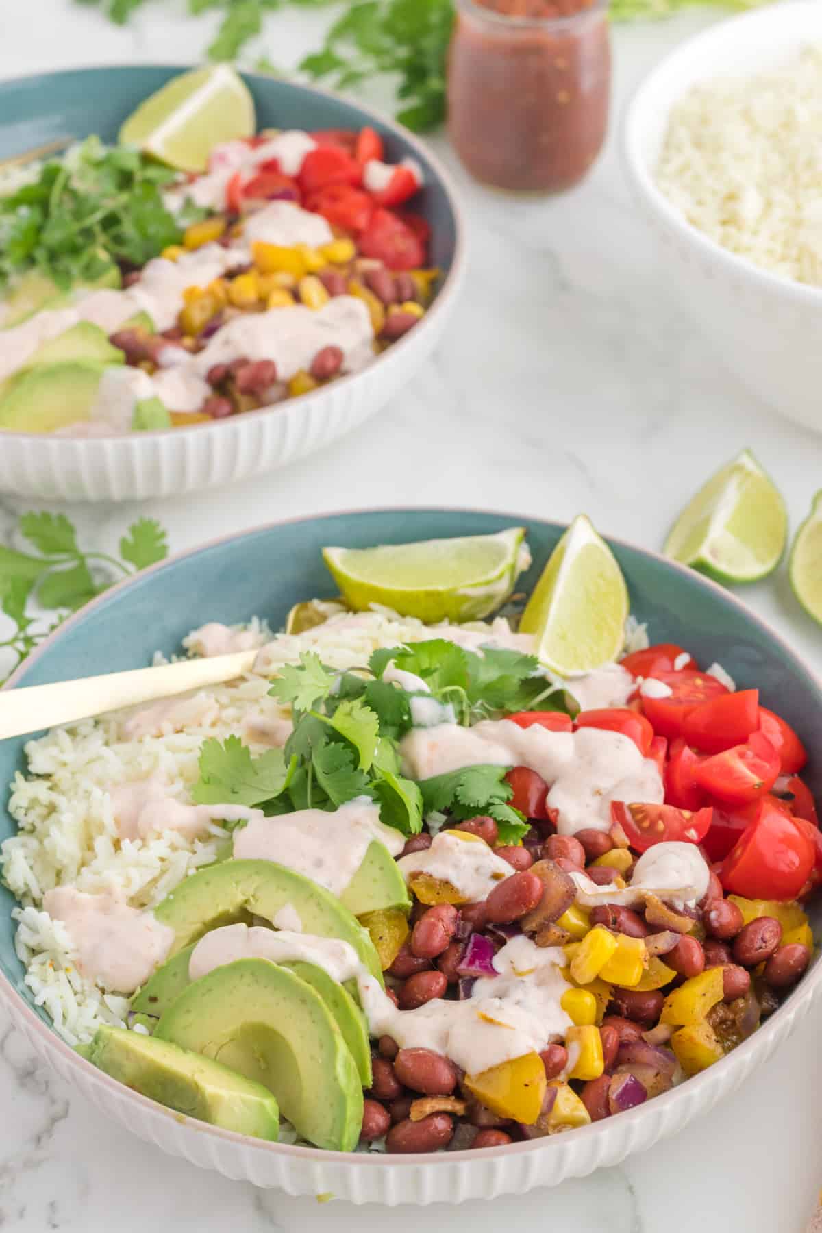 BUDDHA BOWL SERVE WITH FRESH CILANTRO AND LIME.