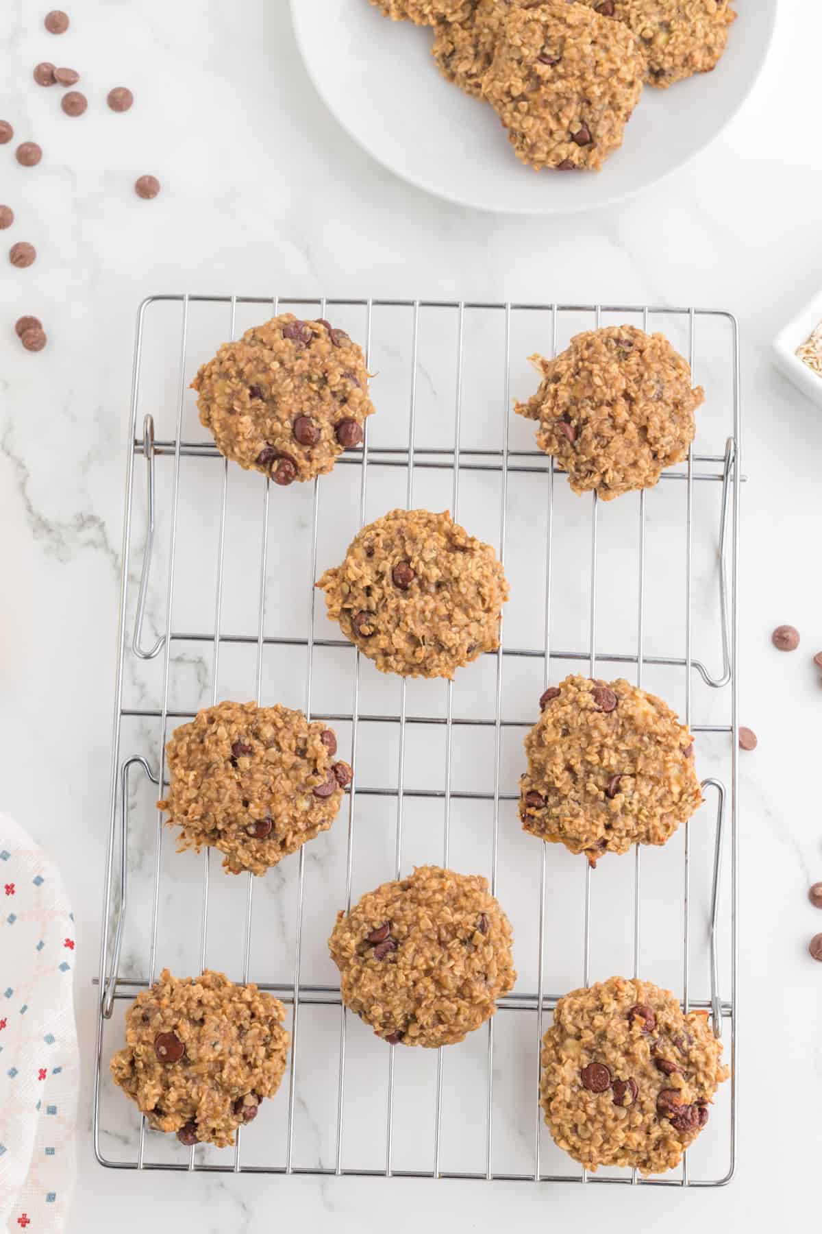 Flourless peanut butter banana oatmeal breakfast cookies on a cooling rack top view.