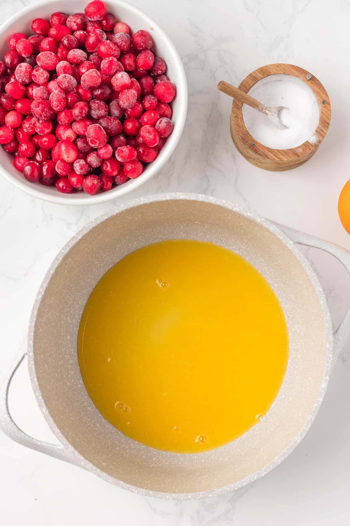 Orange juice in a pot.