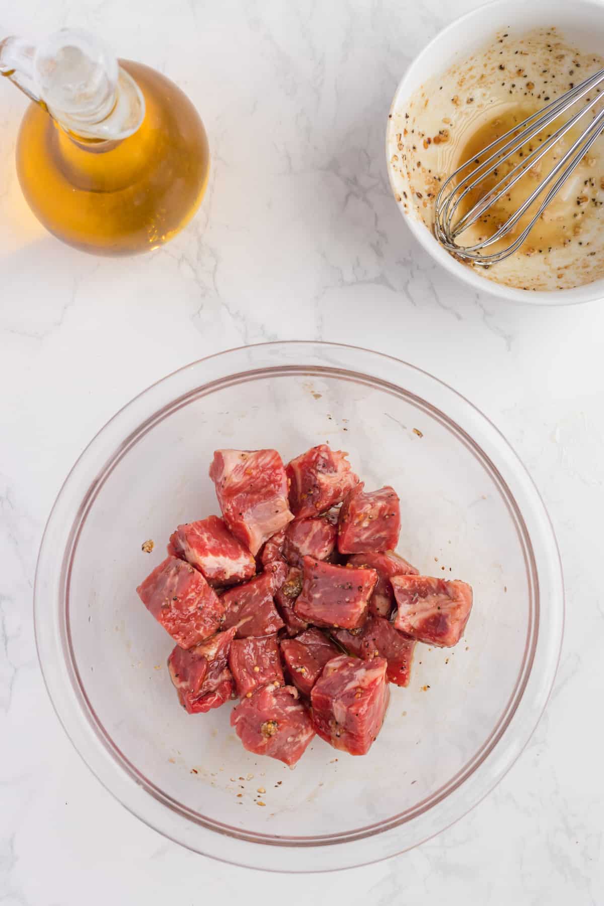 steak in cube in a bowl.