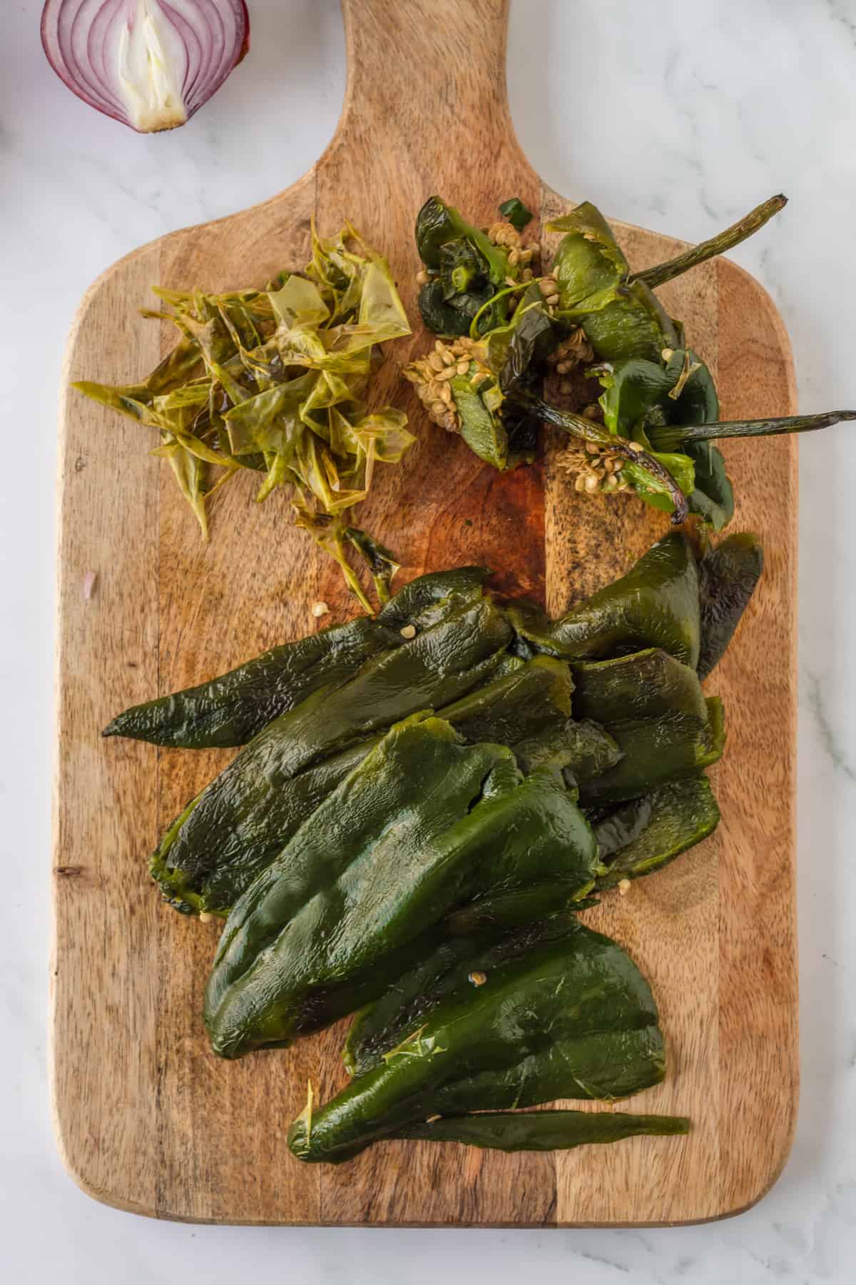 Removing the skin of the poblano peppers